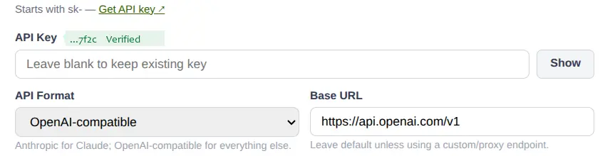 The API key field showing a verified key, the API format selector and the base URL for a custom or proxy endpoint